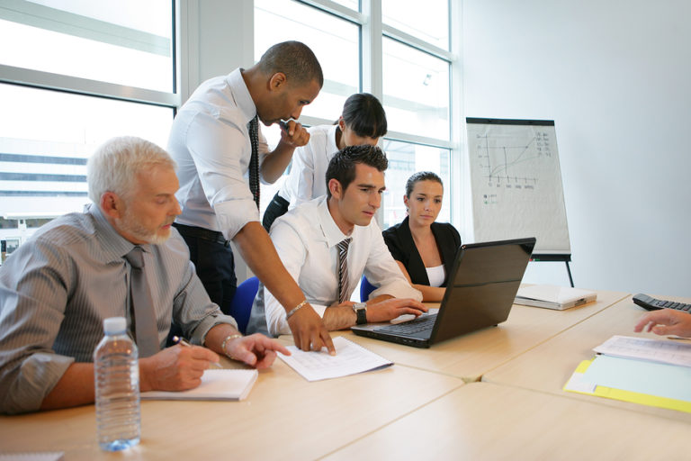 bigstock-Business-people-in-a-meeting-w