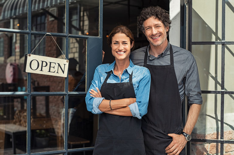 bigstock-Two-cheerful-small-business-ow-277396642
