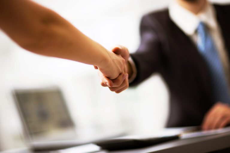 bigstock-Business-people-shaking-hands