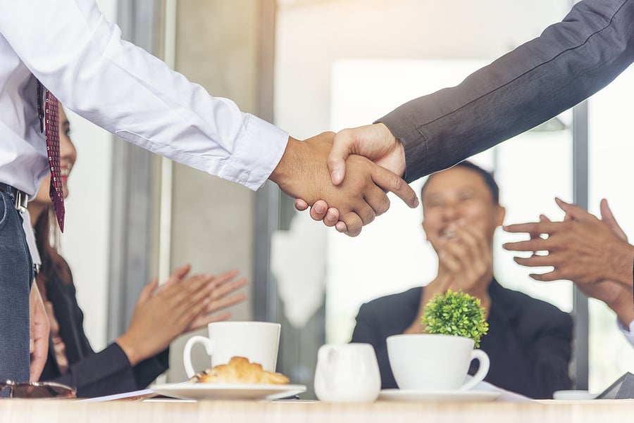bigstock-Team-Business-Partners-Shaking hand